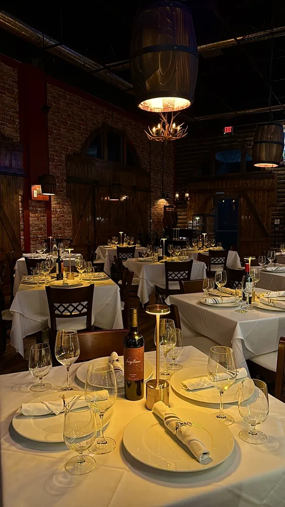 A candlelit table set for dinner